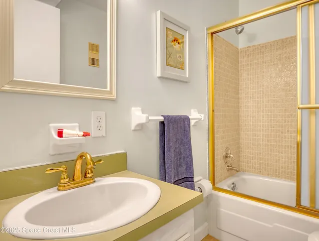 a bathroom with a sink and a bathtub