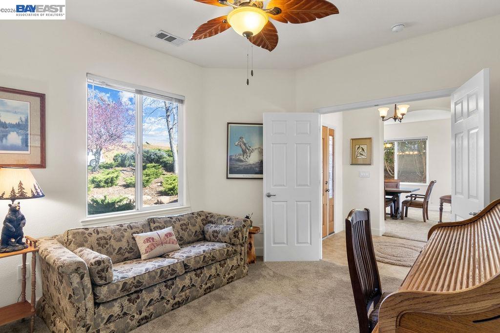 1105 Paradise Peak Road Valley Springs, CA 95252 - Photo 22 of 52 a living room with furniture and a large window