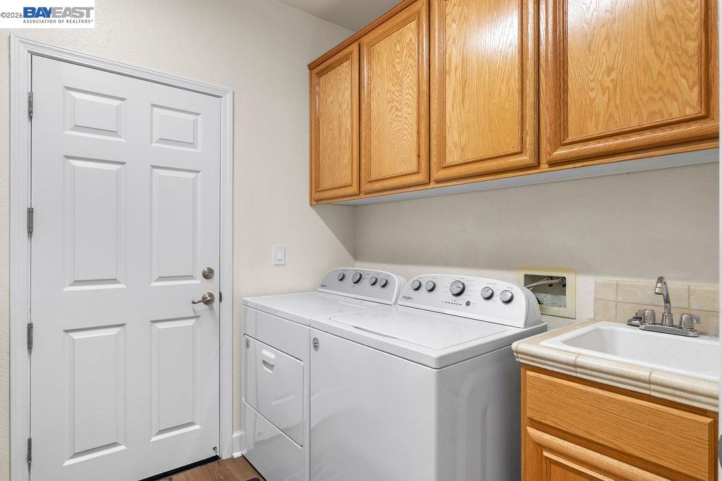 1105 Paradise Peak Road Valley Springs, CA 95252 - Photo 25 of 52 a utility room with dryer and washer