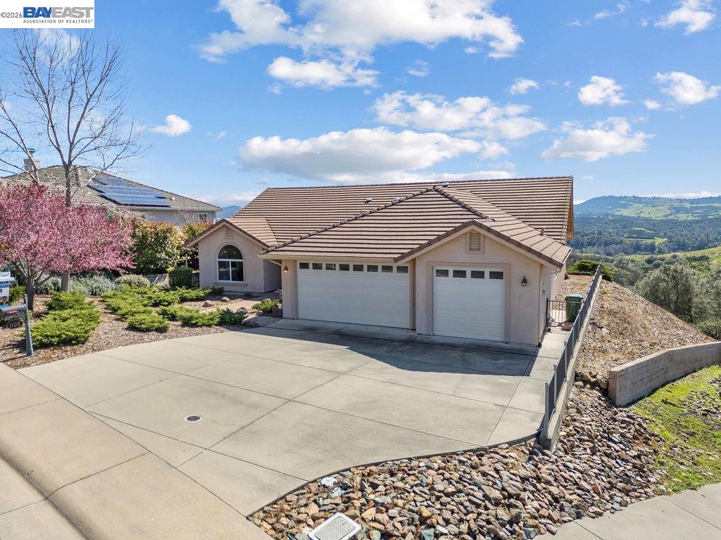 1105 Paradise Peak Road Valley Springs, CA 95252 - Photo 3 of 52 a view of a house with a bench