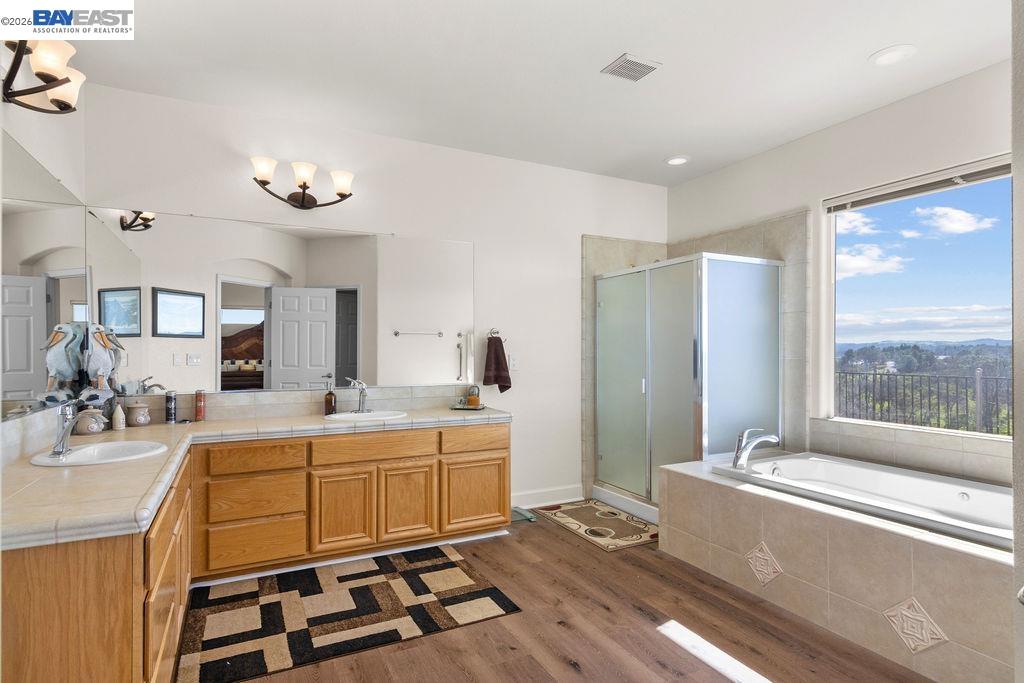 1105 Paradise Peak Road Valley Springs, CA 95252 - Photo 35 of 52 a large white kitchen with a large window