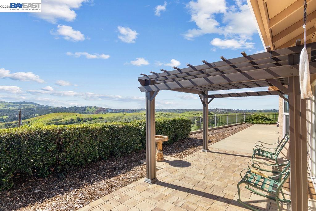 1105 Paradise Peak Road Valley Springs, CA 95252 - Photo 43 of 52 a view of a swimming pool with a porch