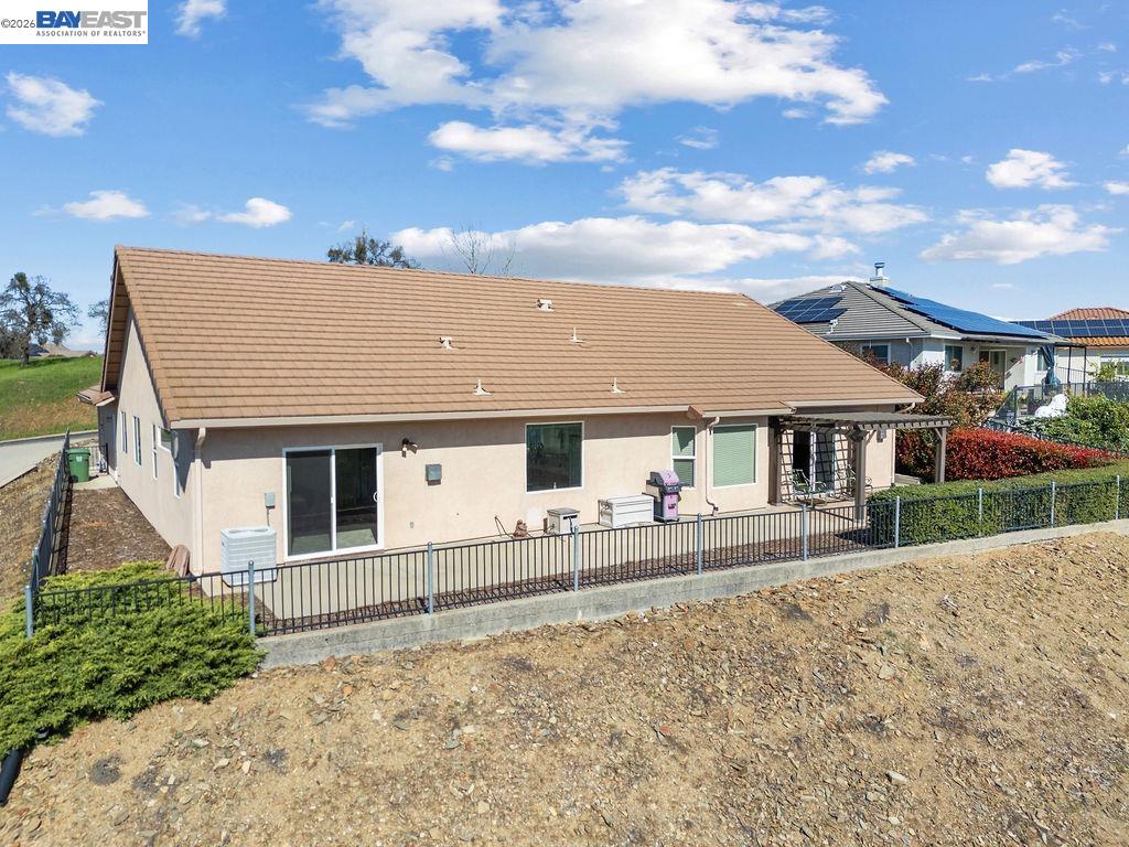 1105 Paradise Peak Road Valley Springs, CA 95252 - Photo 46 of 52 front view of a house with a yard