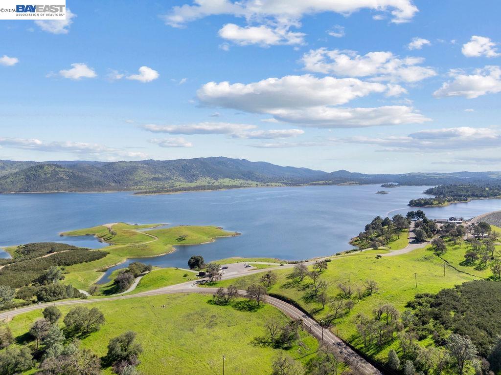 1105 Paradise Peak Road Valley Springs, CA 95252 - Photo 51 of 52 a view of a lake with a mountain
