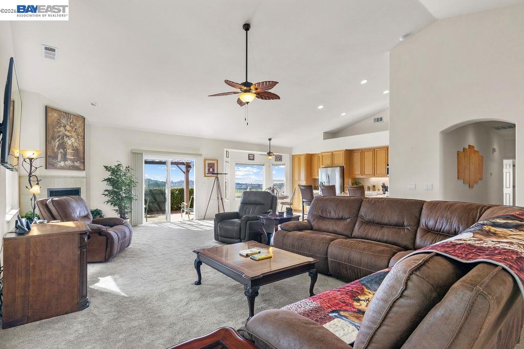 1105 Paradise Peak Road Valley Springs, CA 95252 - Photo 8 of 52 a living room with furniture ceiling fan and a rug