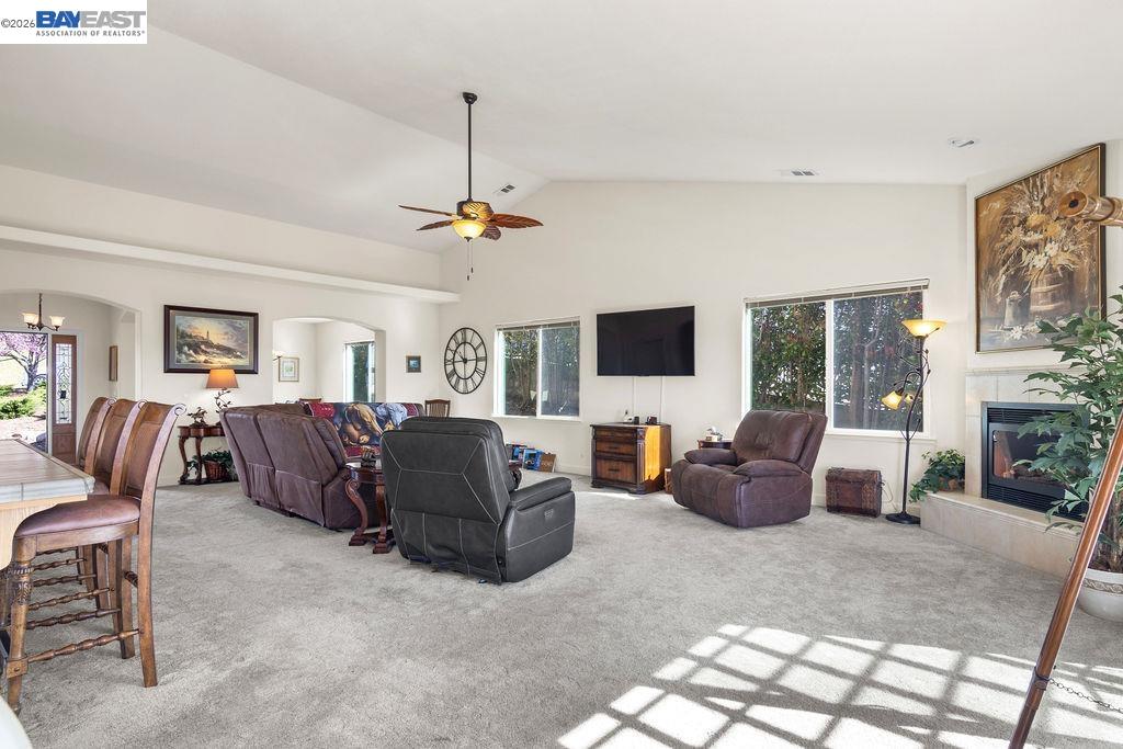 1105 Paradise Peak Road Valley Springs, CA 95252 - Photo 9 of 52 a living room with furniture a flat screen tv and a window