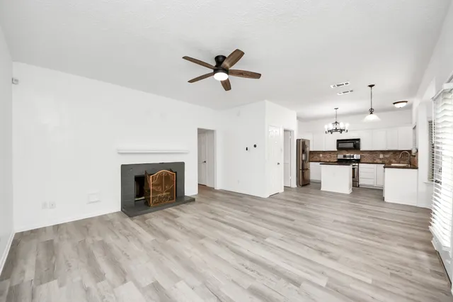 a view of a kitchen with a sink and a kitchen