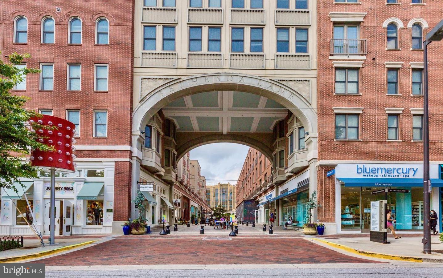 7036 Strathmore Street, Unit 311 Chevy Chase, MD 20815 - Photo 23 of 27 a view of a building with a street