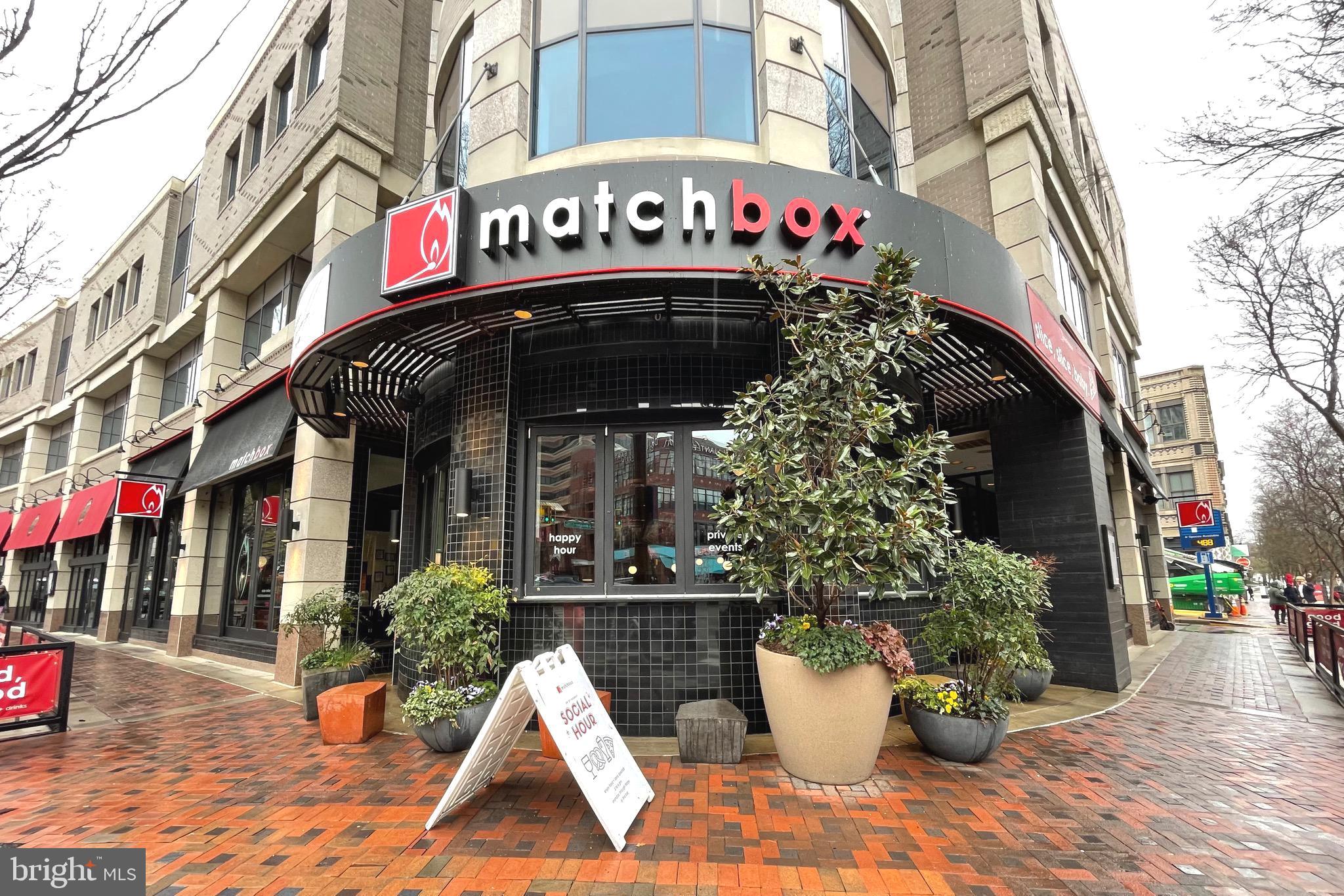 7036 Strathmore Street, Unit 311 Chevy Chase, MD 20815 - Photo 27 of 27 a view of a building with potted plants