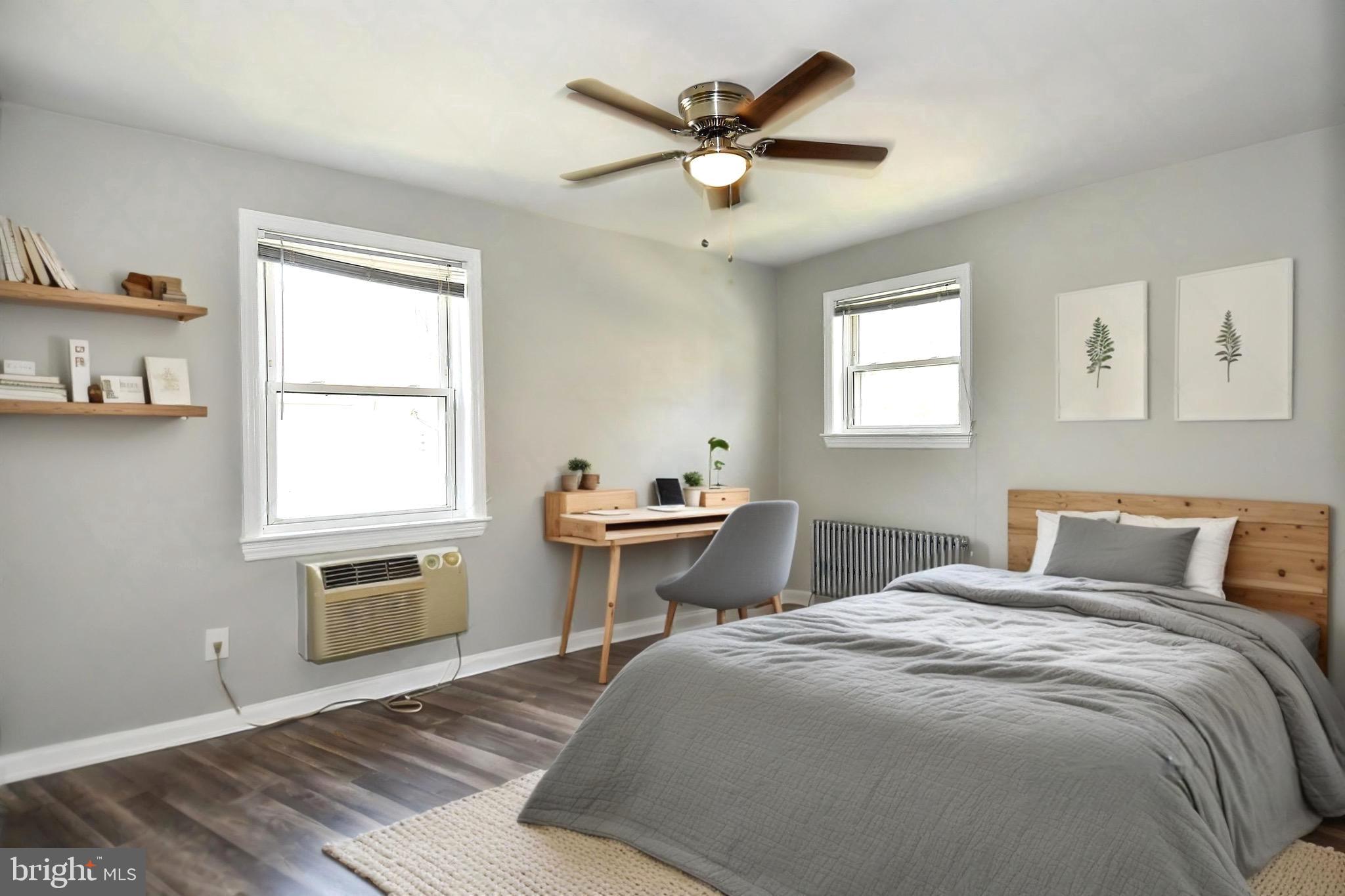 7036 Strathmore Street, Unit 311 Chevy Chase, MD 20815 - Photo 4 of 27 a bedroom with a bed and a window