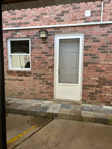 a view of a pathway with a yard