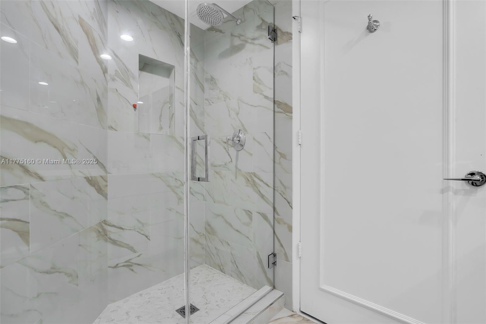 765 Crandon Boulevard, Unit 202 Key Biscayne, FL 33149 - Photo 21 of 41 a bathroom with a shower