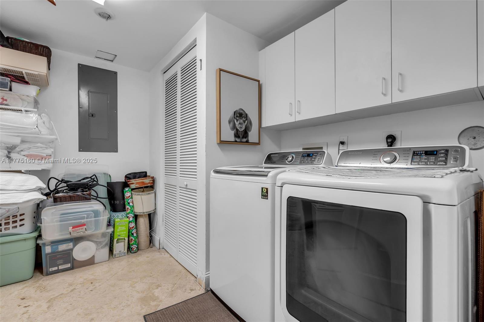 765 Crandon Boulevard, Unit 202 Key Biscayne, FL 33149 - Photo 26 of 41 a utility room with sink dryer and washer