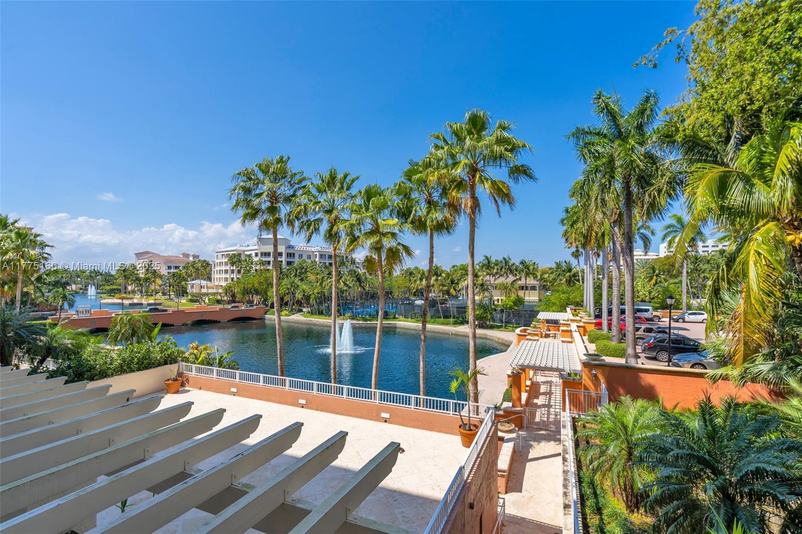 765 Crandon Boulevard, Unit 202 Key Biscayne, FL 33149 - Photo 27 of 41 a view of swimming pool with lake view and mountain view