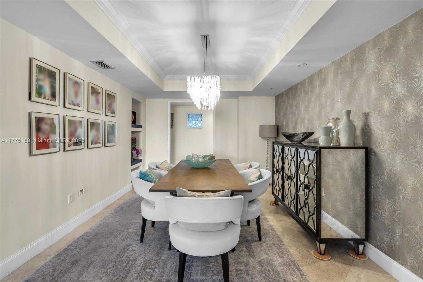 765 Crandon Boulevard, Unit 202 Key Biscayne, FL 33149 - Photo 8 of 41 a dining room with furniture and window