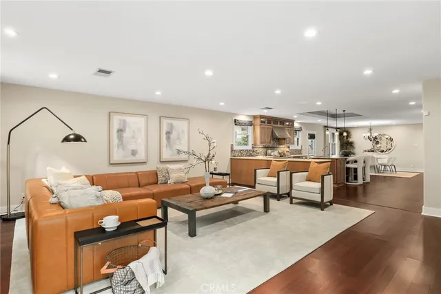 a living room with furniture and a table