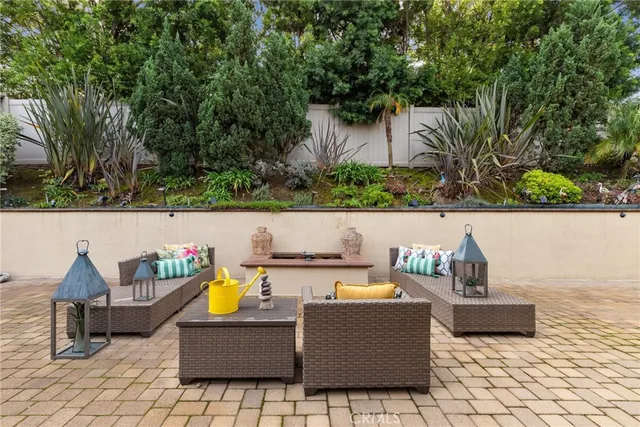 a outdoor living space with furniture and garden view