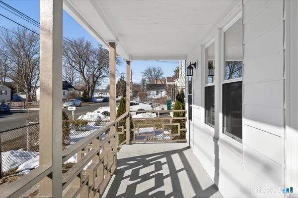 a view of a entryway with wooden floor