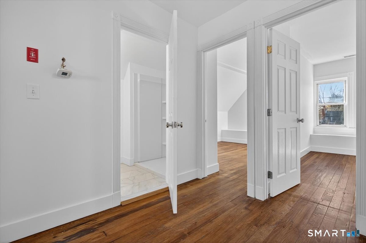 62 General Street Stratford, CT 06615 - Photo 16 of 40 wooden floor with white walls