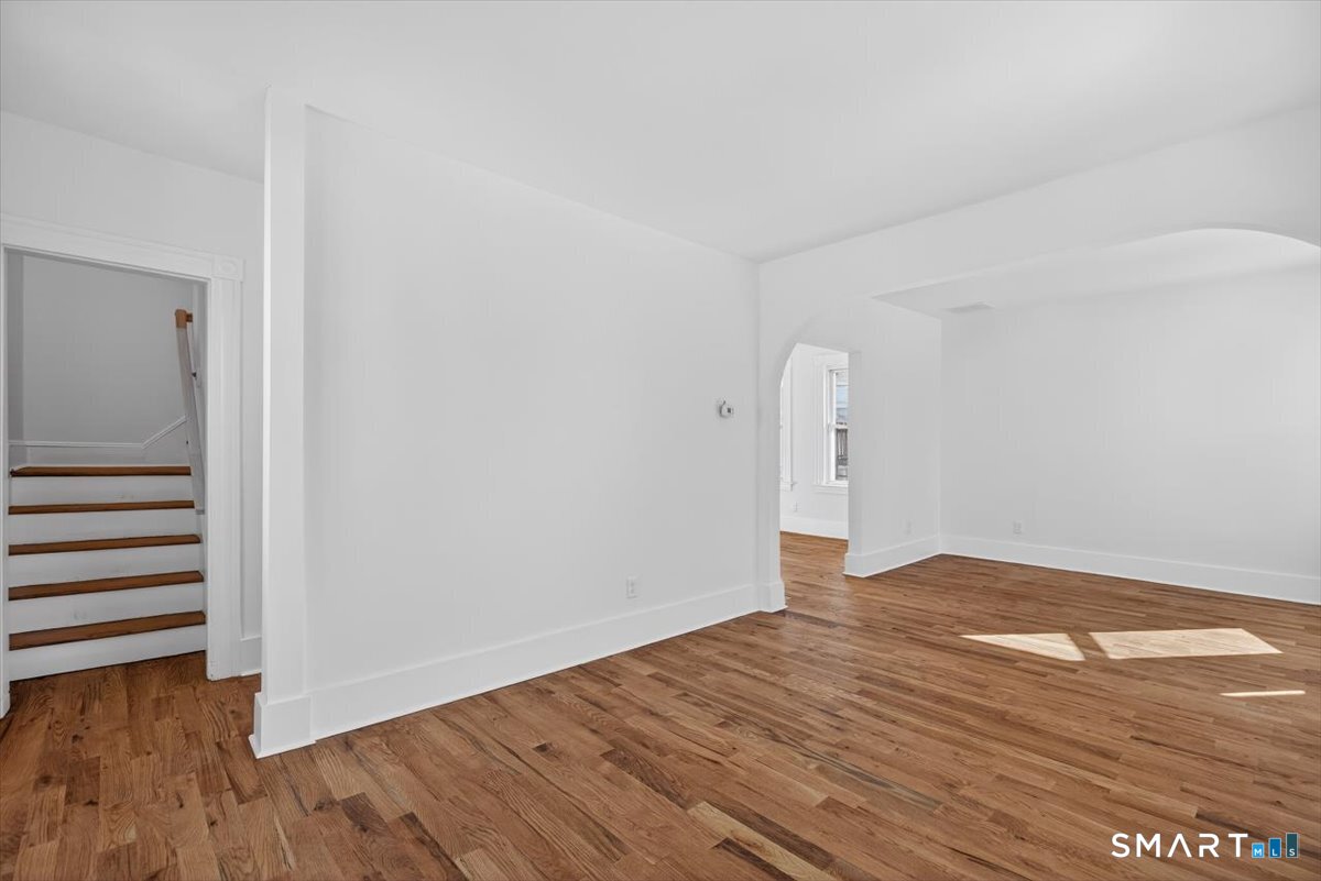 62 General Street Stratford, CT 06615 - Photo 19 of 40 a view of empty room with wooden floor