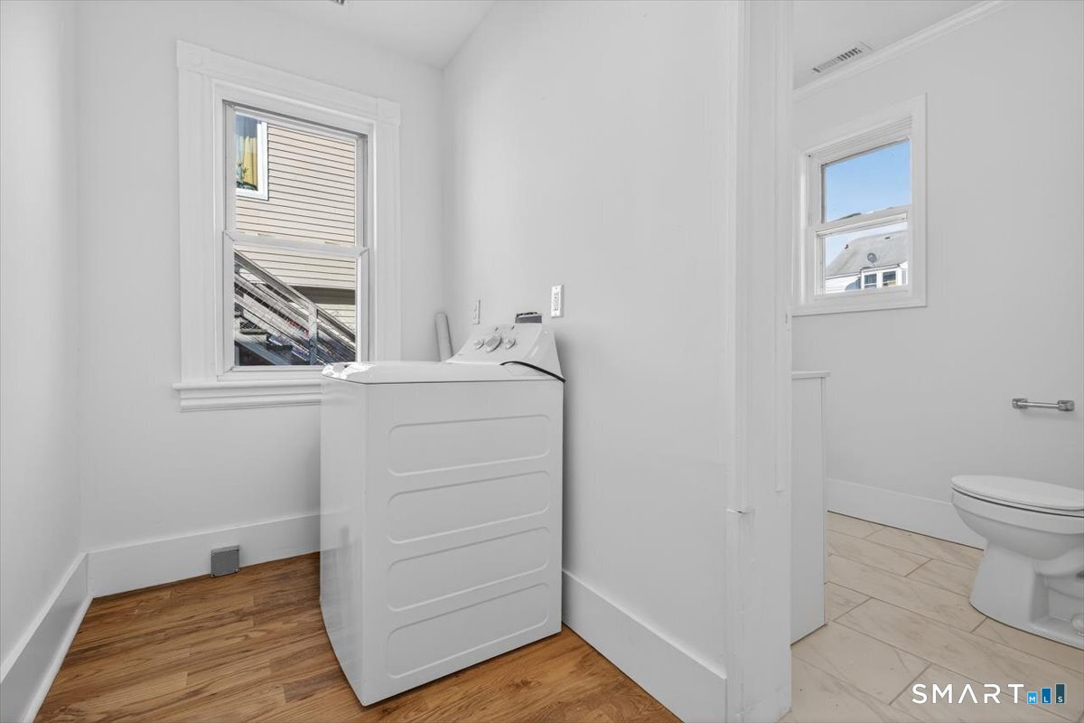 62 General Street Stratford, CT 06615 - Photo 26 of 40 a bathroom with a toilet