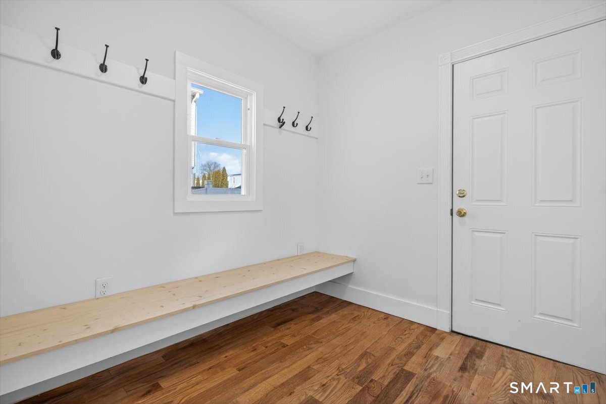 62 General Street Stratford, CT 06615 - Photo 27 of 40 a view of room with wooden floor and window