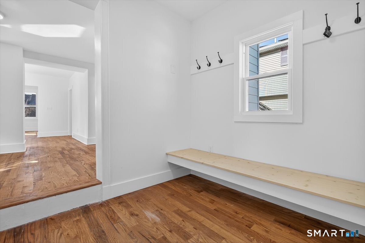 62 General Street Stratford, CT 06615 - Photo 28 of 40 a view of room with window and hallway