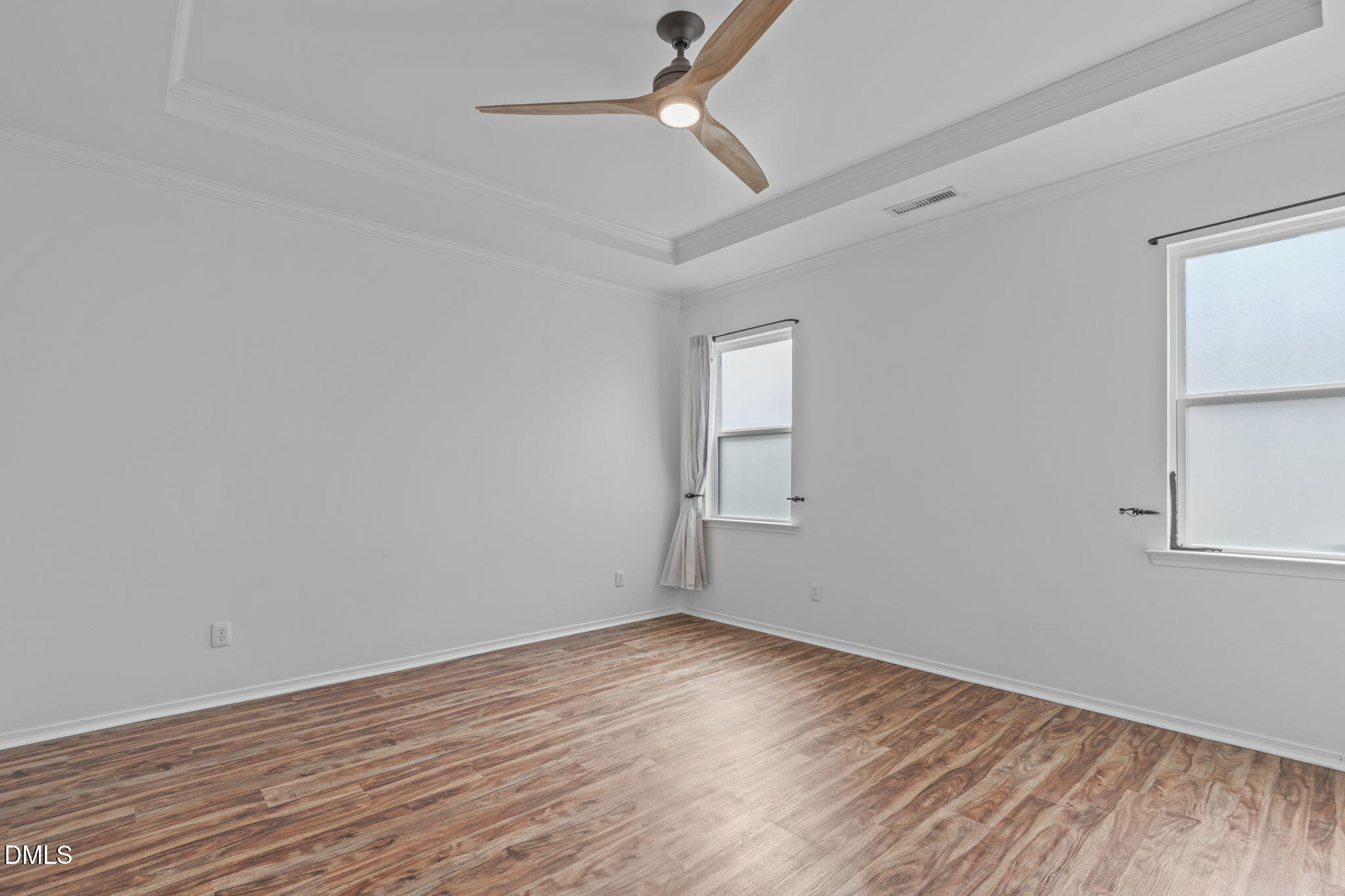 124 Daneborg Road Durham, NC 27703 - Photo 10 of 40 wooden floor in an empty room with a window