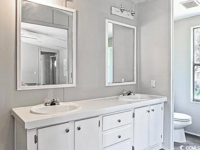 600 Ermine Road, Unit LOT 620 West Columbia, SC 29170 - Photo 4 of 11 Bathroom with double vanity and toilet