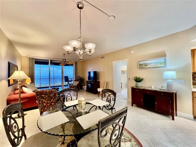 a bedroom with a bed and a piano