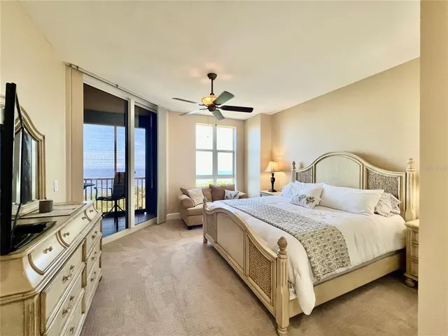 a spacious bathroom with a tub shower and sink