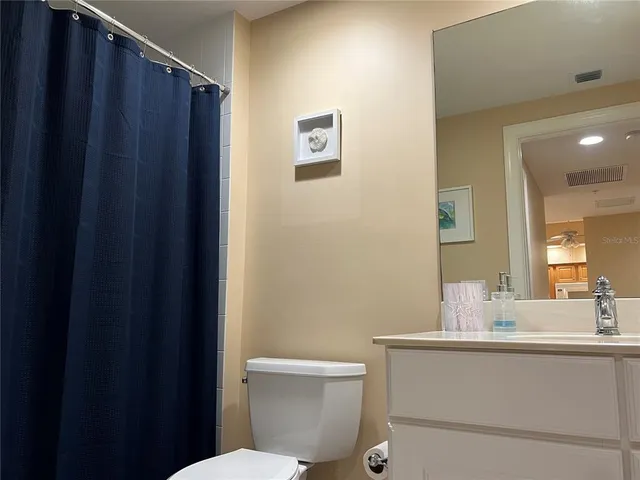 a view of a city with tall buildings in background