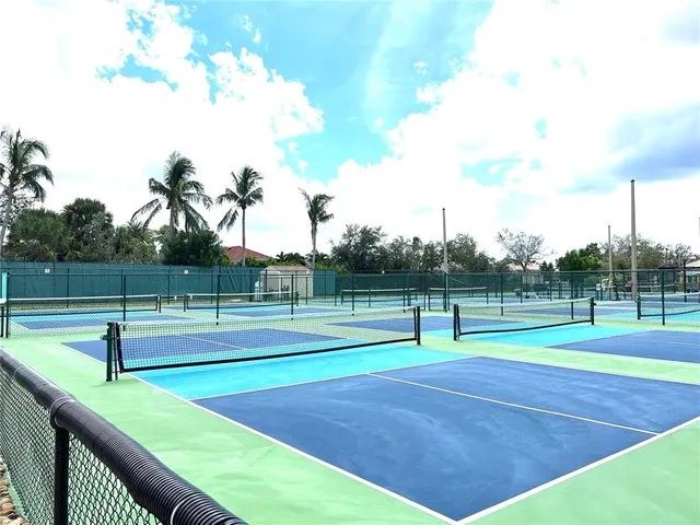 a view of a chairs and tables in patio
