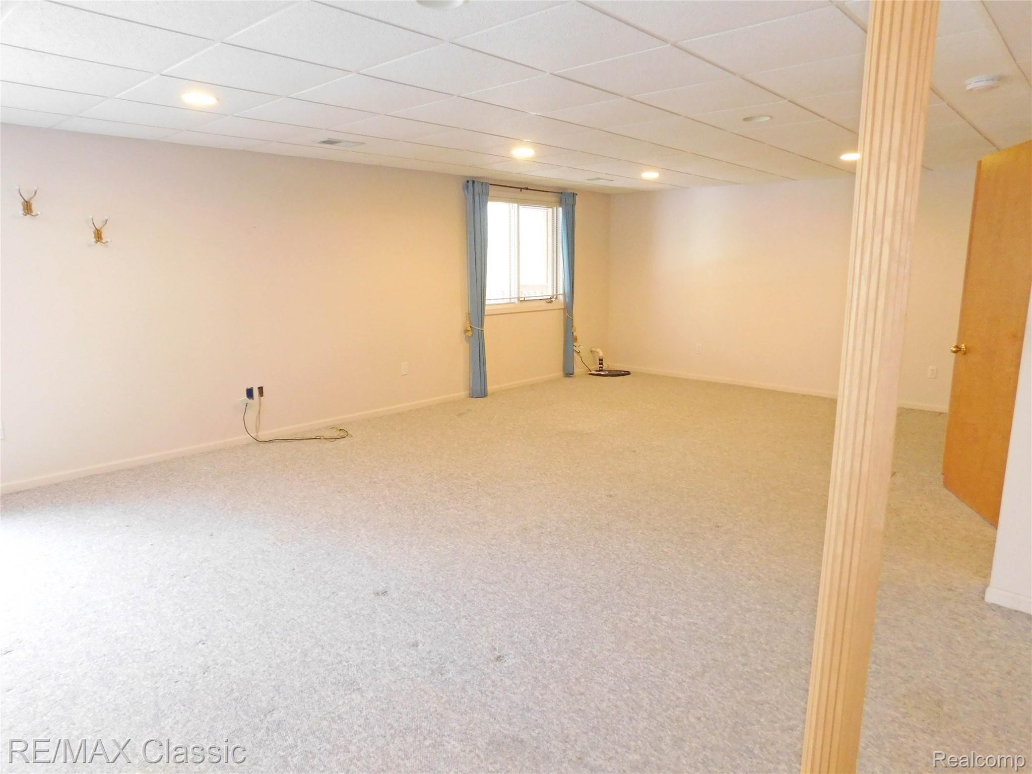 21840 River Ridge Trail, Unit 104 Farmington, MI 48335 - Photo 23 of 35 FINISHED LOWER LEVEL