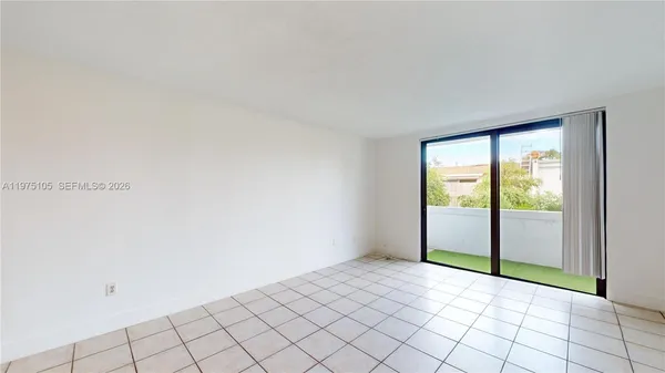 a view of an empty room and window