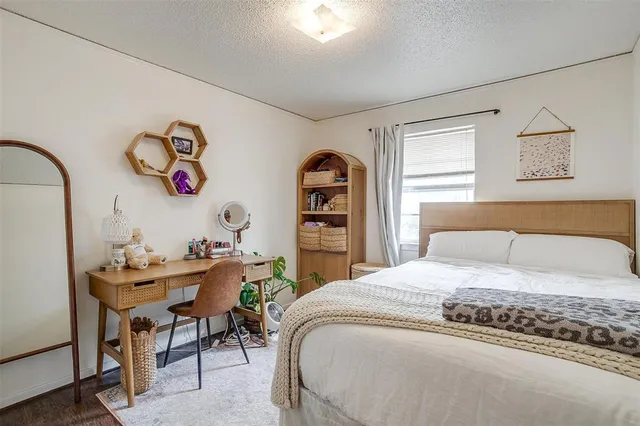 a bedroom with a bed and a walk in closet
