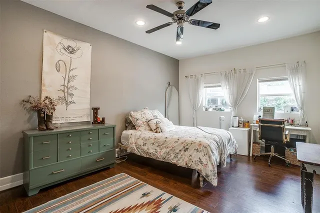 a bedroom with a bed furniture and a window