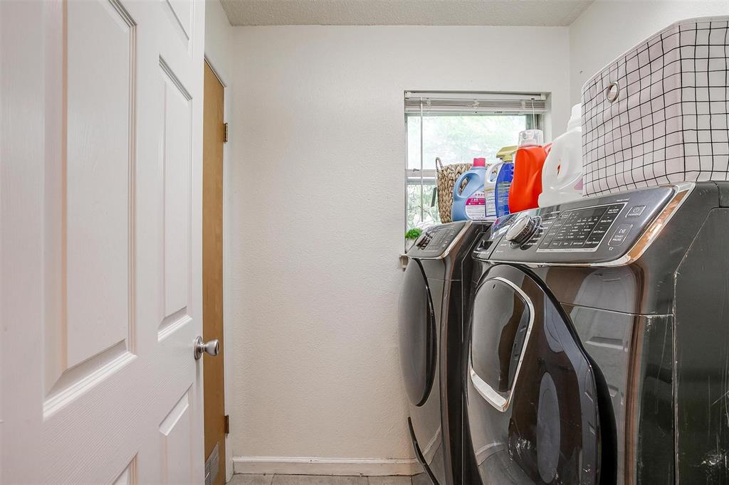 3217 Lubbock Avenue Fort Worth, TX 76109 - Photo 34 of 38 a view of walk in closet with clothes and shoes