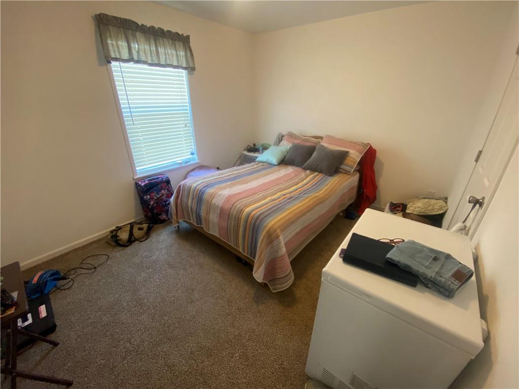 232 Center School Road Jefferson, PA 15344 - Photo 14 of 22 a bedroom with a bed and a window