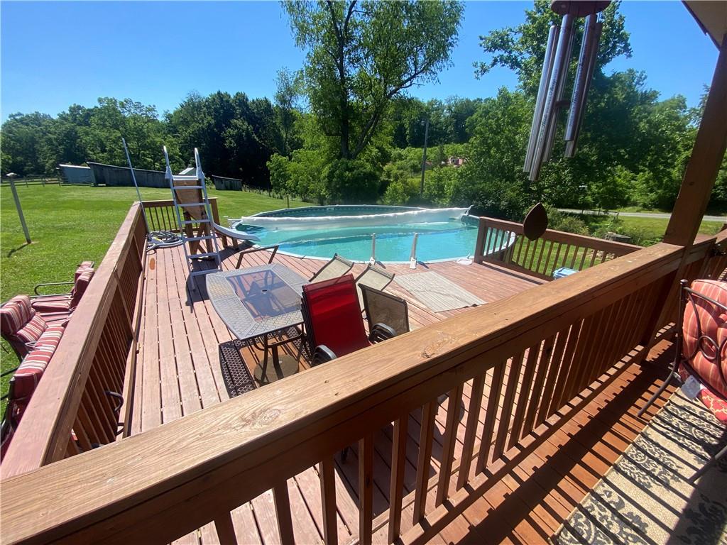 232 Center School Road Jefferson, PA 15344 - Photo 18 of 22 a view of an outdoor sitting area with swimming pool