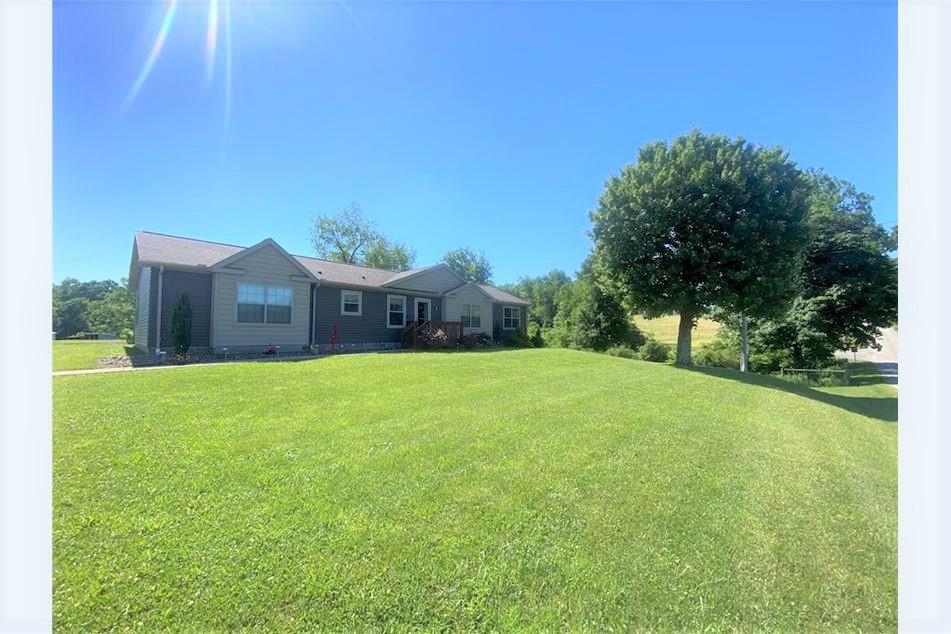 232 Center School Road Jefferson, PA 15344 - Photo 2 of 22 a front view of a house with a yard