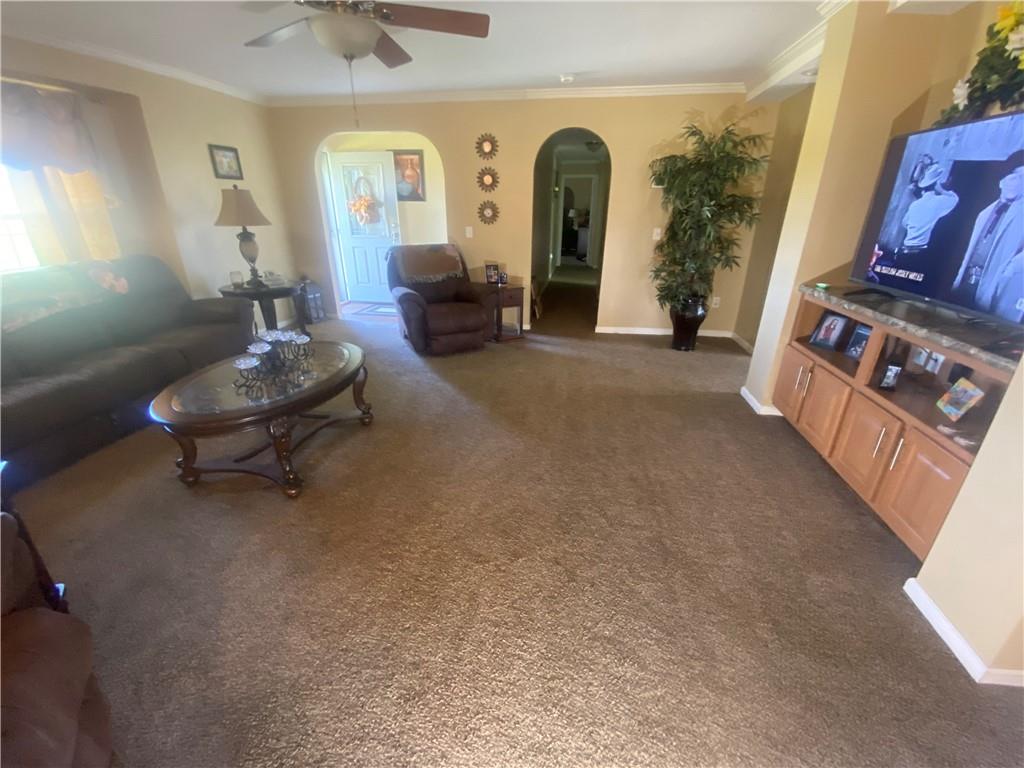 232 Center School Road Jefferson, PA 15344 - Photo 9 of 22 a living room with furniture and a dining table