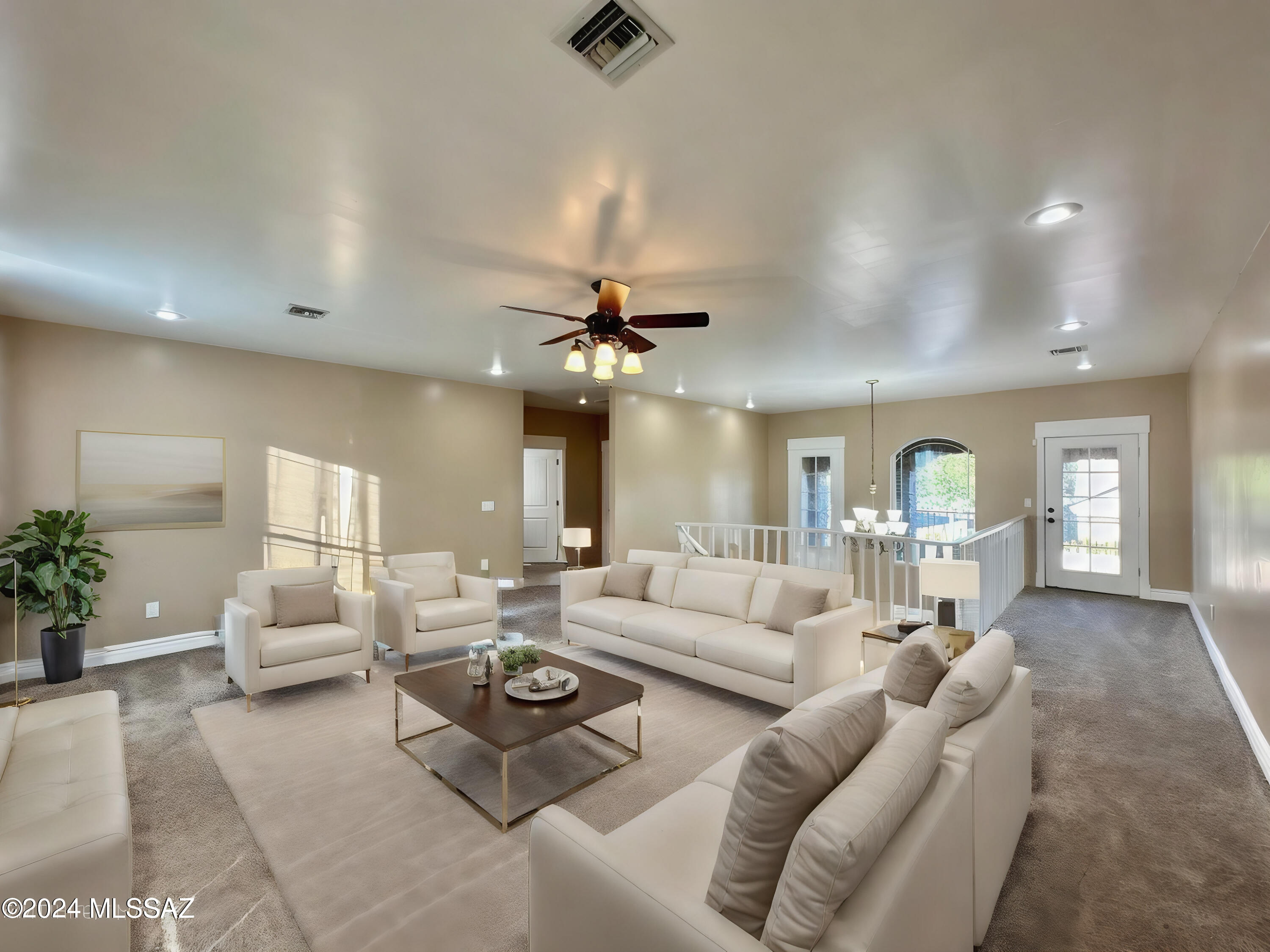 508 Eagle Meadow Loop Thatcher, AZ 85552 - Photo 23 of 32 a living room with furniture and a chandelier