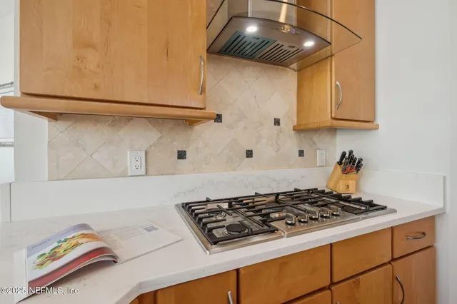 a view of a hallway with windows