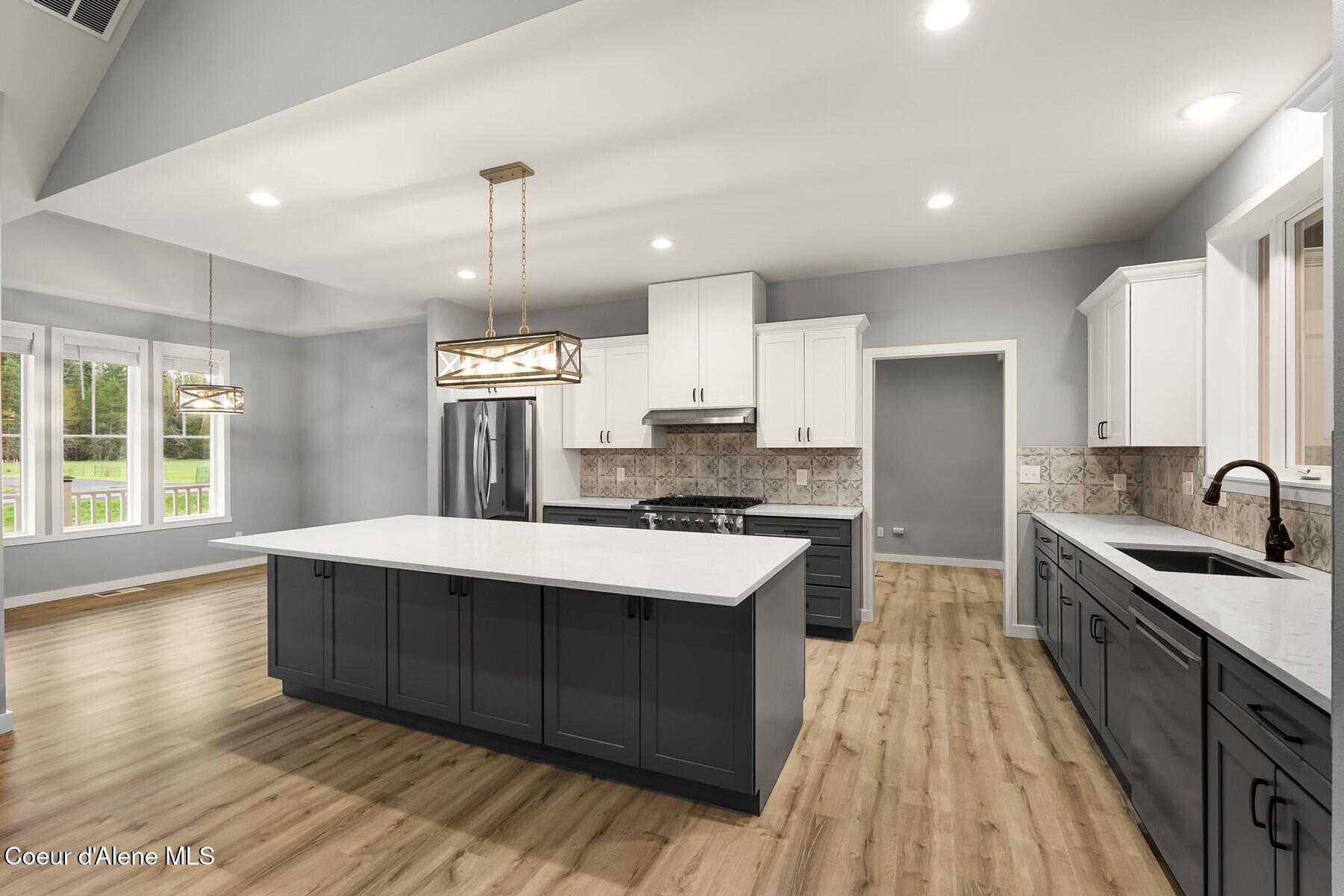 51 Pumphouse Lane Sagle, ID 83860 - Photo 8 of 45 KitchenDining with Island