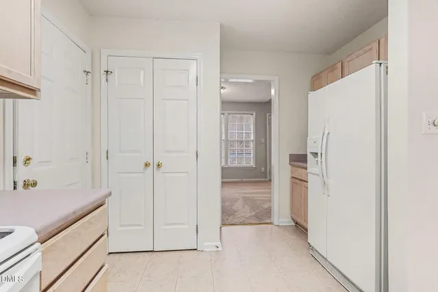 a bathroom with a tub shower and sink