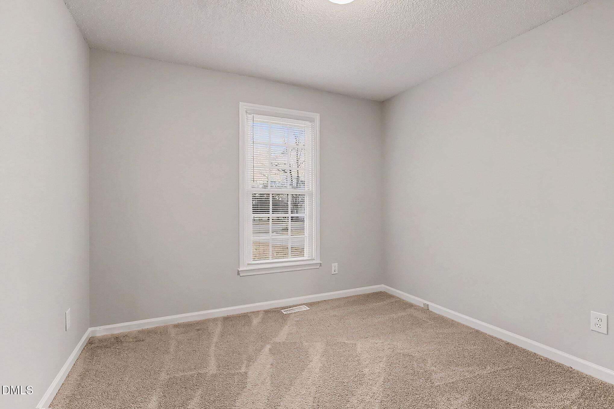 7 Neptune Court Durham, NC 27712 - Photo 27 of 39 an empty room with a window