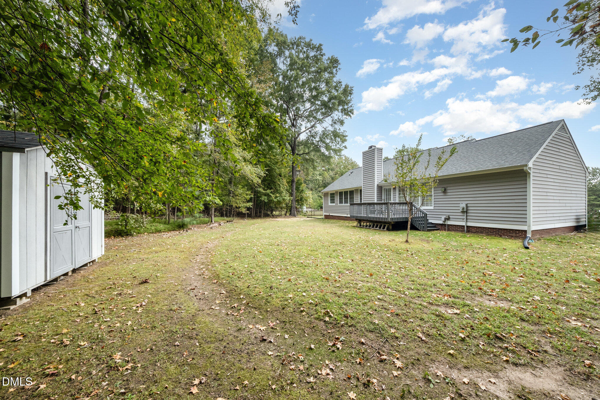 7 Neptune Court Durham, NC 27712 - Photo 34 of 39 a view of a backyard with large trees