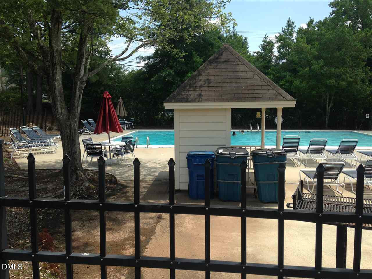 7 Neptune Court Durham, NC 27712 - Photo 37 of 39 a view of a patio with chairs and table of the backyard