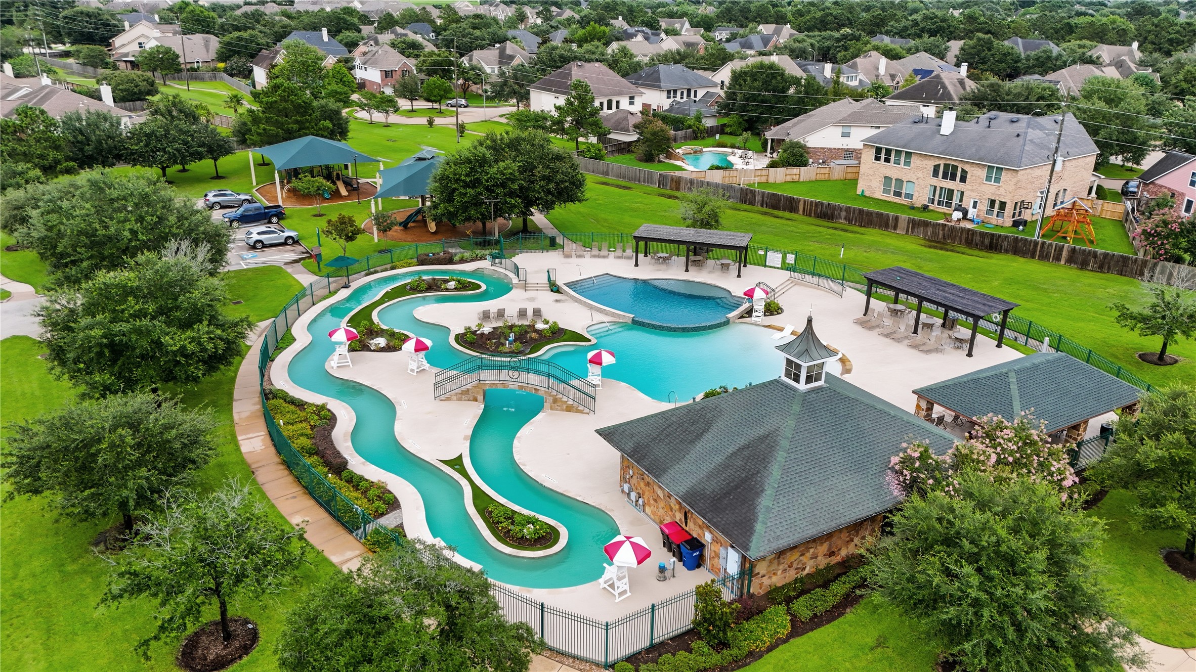 10410 Pitcataway Drive Spring, TX 77379 - Photo 33 of 47 The community offers several options in terms of pools, including a Lazy River, which is extremely relaxing offering a fun day outdoors that includes the option of covered picnic pavilions and kiddie playgrounds.